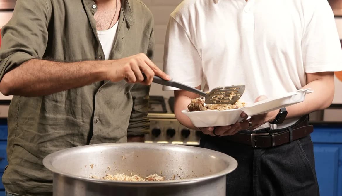 A warm Dawat in a Box meal being served